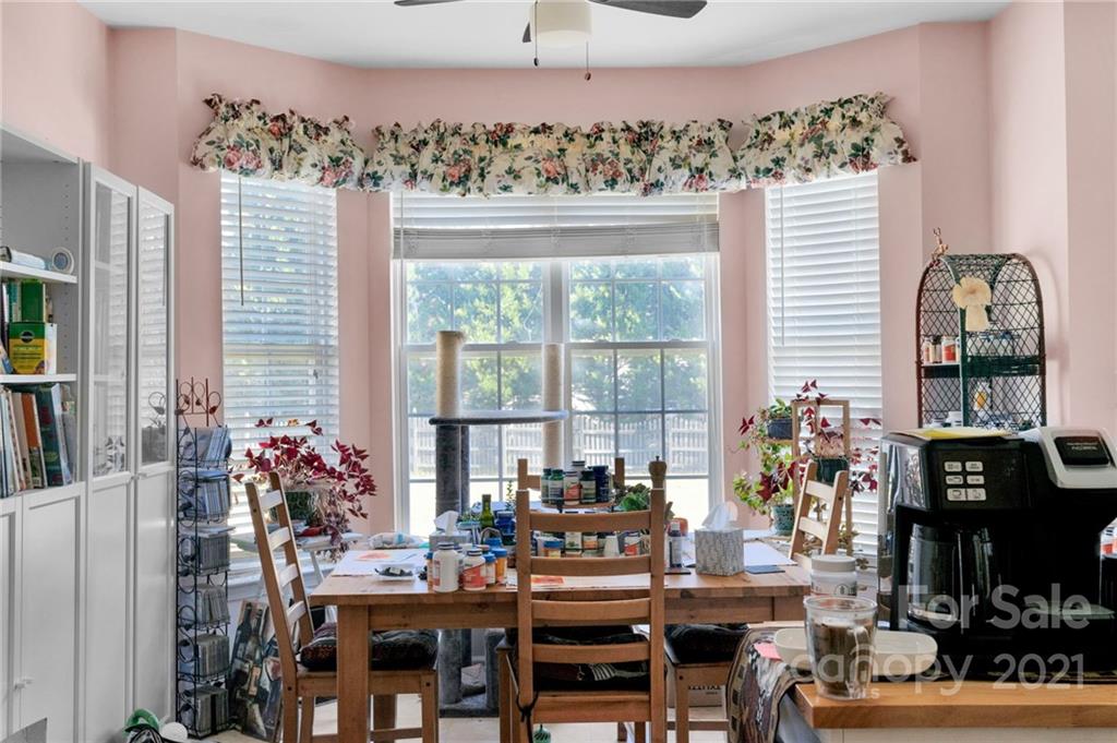 3800 Ruth Street Indian Trail, NC 28079 - Photo 16 of 34 a view of a dining room with furniture and window