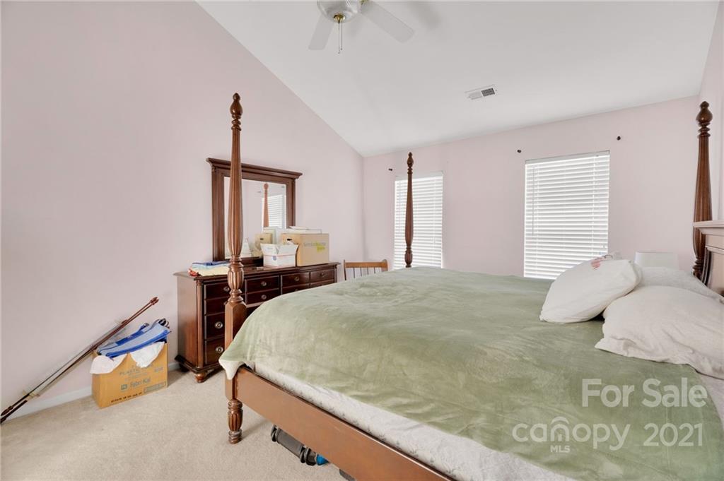 3800 Ruth Street Indian Trail, NC 28079 - Photo 22 of 34 a bedroom with a bed and wooden floor