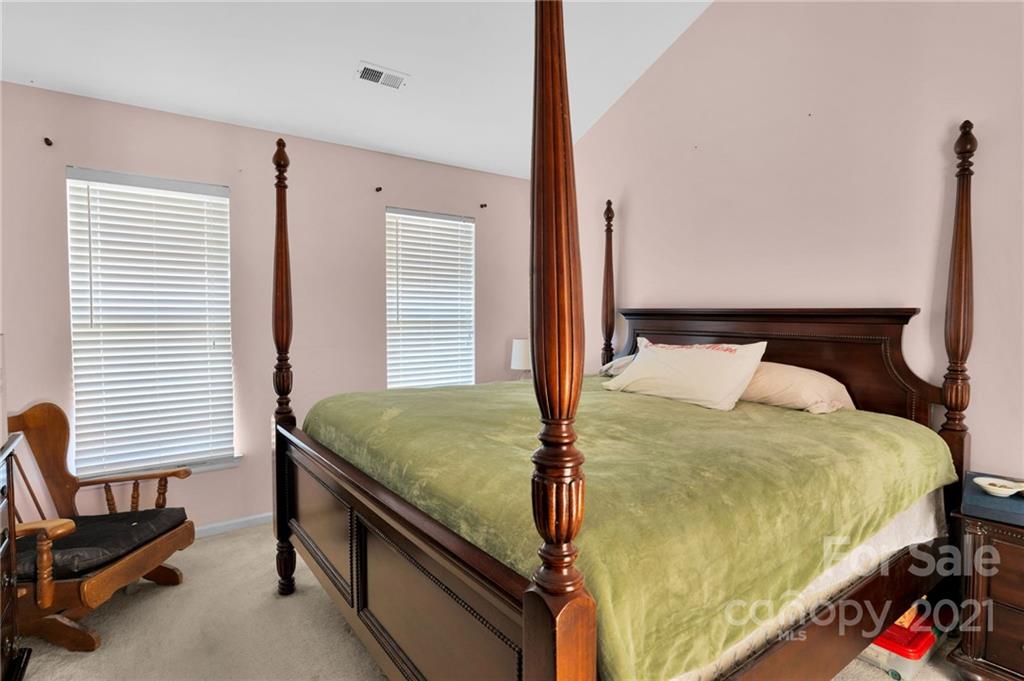 3800 Ruth Street Indian Trail, NC 28079 - Photo 23 of 34 a bed sitting in a bedroom next to a window