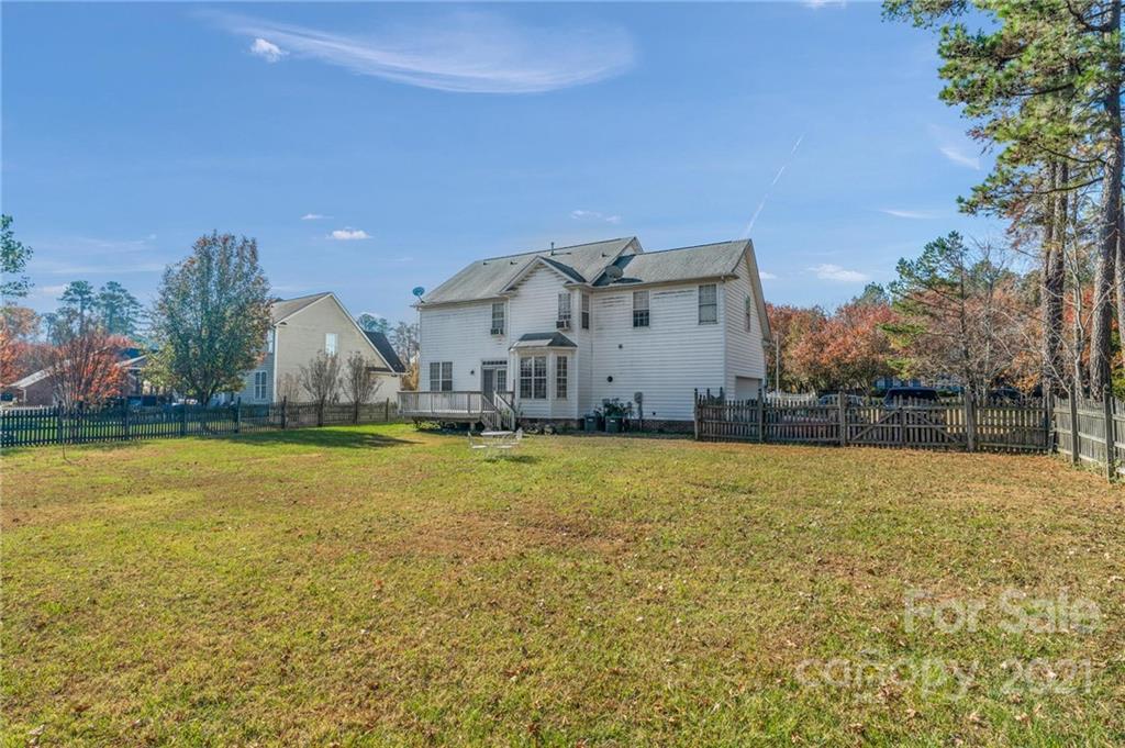 3800 Ruth Street Indian Trail, NC 28079 - Photo 27 of 34 a view of a swimming pool and a yard