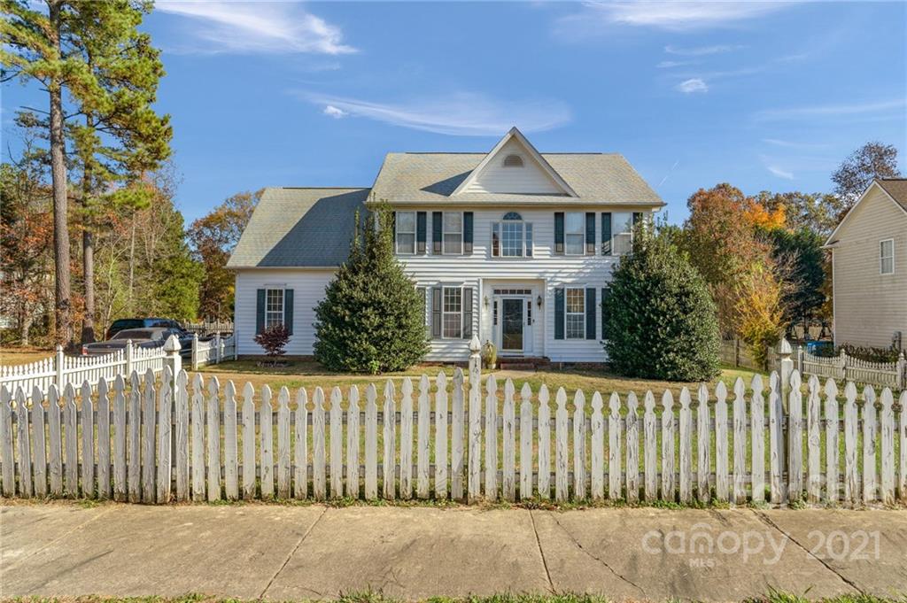 3800 Ruth Street Indian Trail, NC 28079 - Photo 4 of 34 a front view of a house with a garden