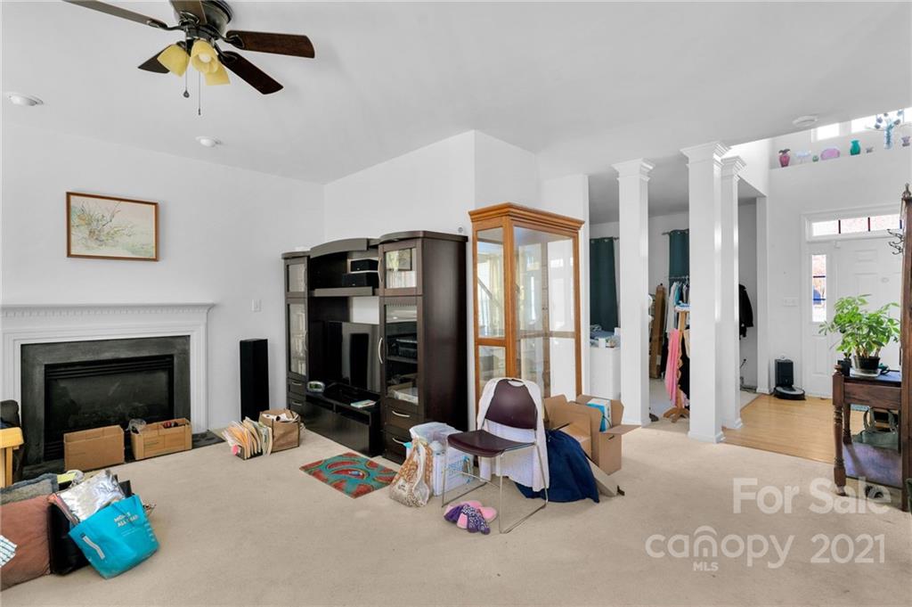 3800 Ruth Street Indian Trail, NC 28079 - Photo 10 of 34 a bedroom with furniture and a fireplace