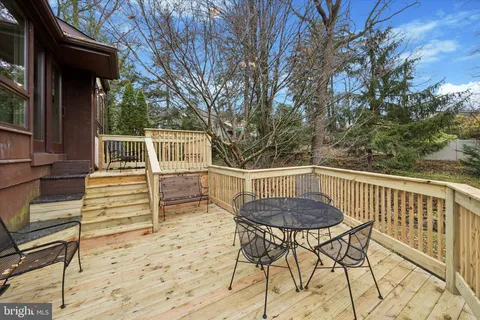 a view of balcony and wooden floor