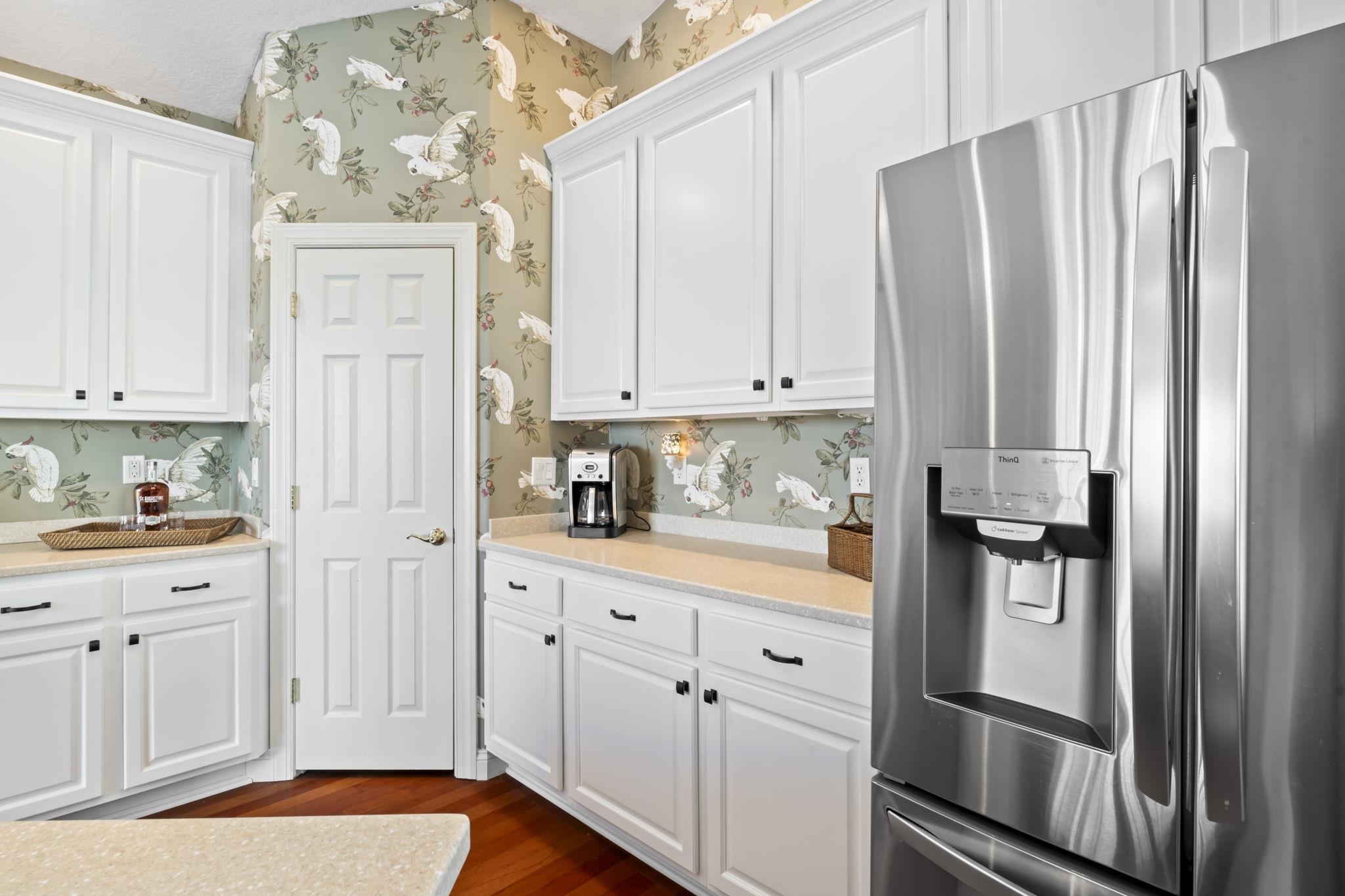 103 Sunset Circle South St. Augustine, FL 32080 - Photo 13 of 55 a kitchen with stainless steel appliances granite countertop a refrigerator and a stove top oven