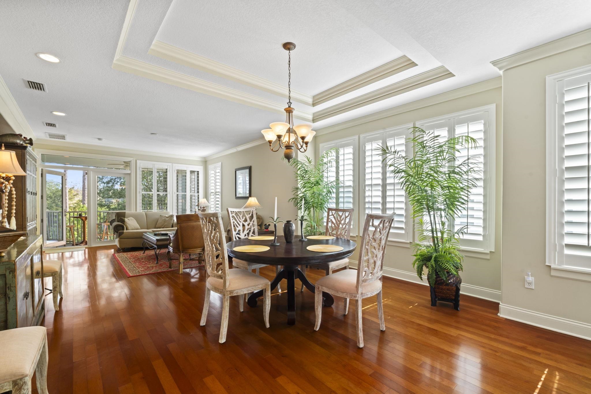 103 Sunset Circle South St. Augustine, FL 32080 - Photo 16 of 55 a view of a dining room with furniture window and wooden floor