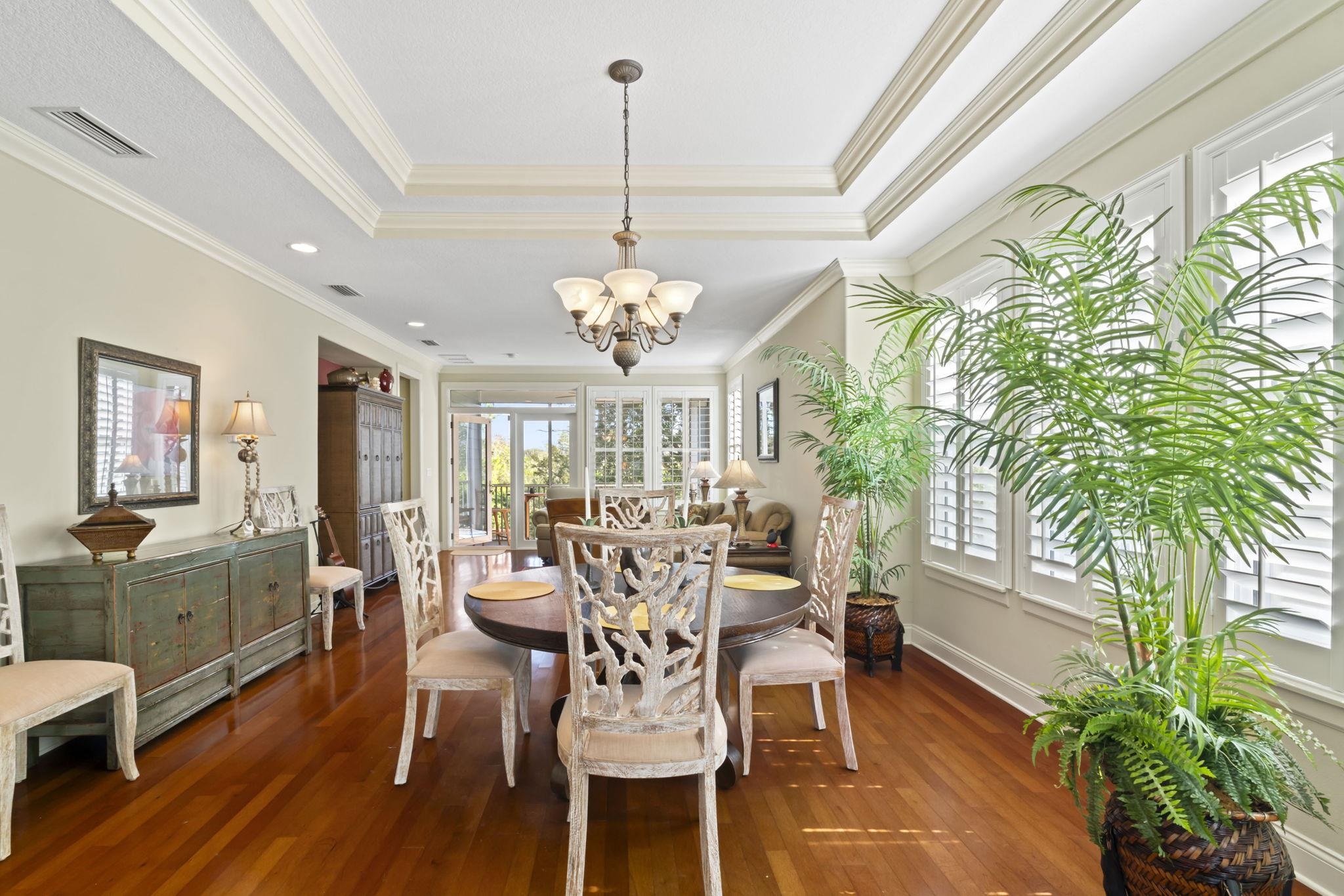 103 Sunset Circle South St. Augustine, FL 32080 - Photo 17 of 55 a view of a dining room with furniture window and wooden floor