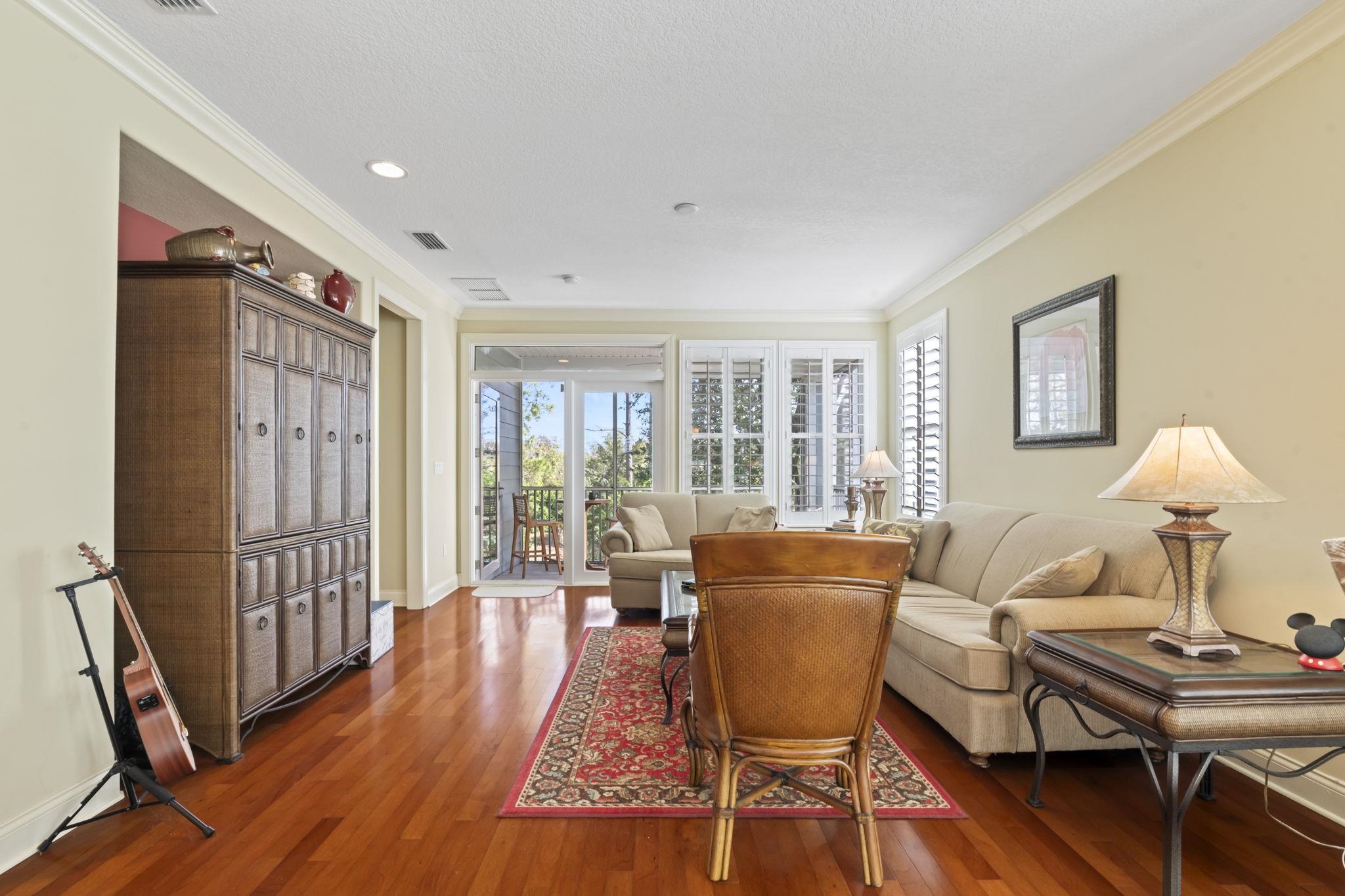 103 Sunset Circle South St. Augustine, FL 32080 - Photo 20 of 55 a living room with furniture and a window