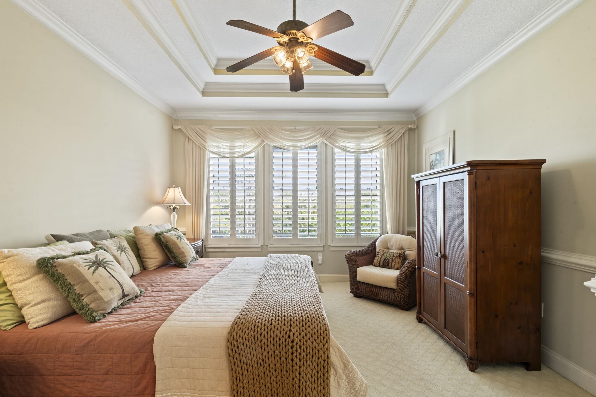 103 Sunset Circle South St. Augustine, FL 32080 - Photo 28 of 55 a bedroom with a bed furniture and a large window