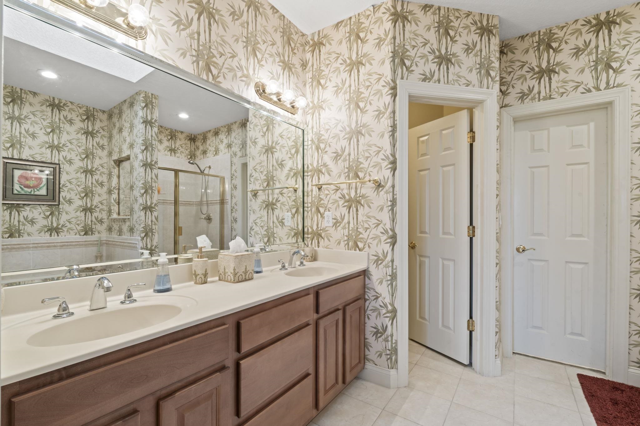 103 Sunset Circle South St. Augustine, FL 32080 - Photo 30 of 55 a bathroom with a double vanity sink mirror and double