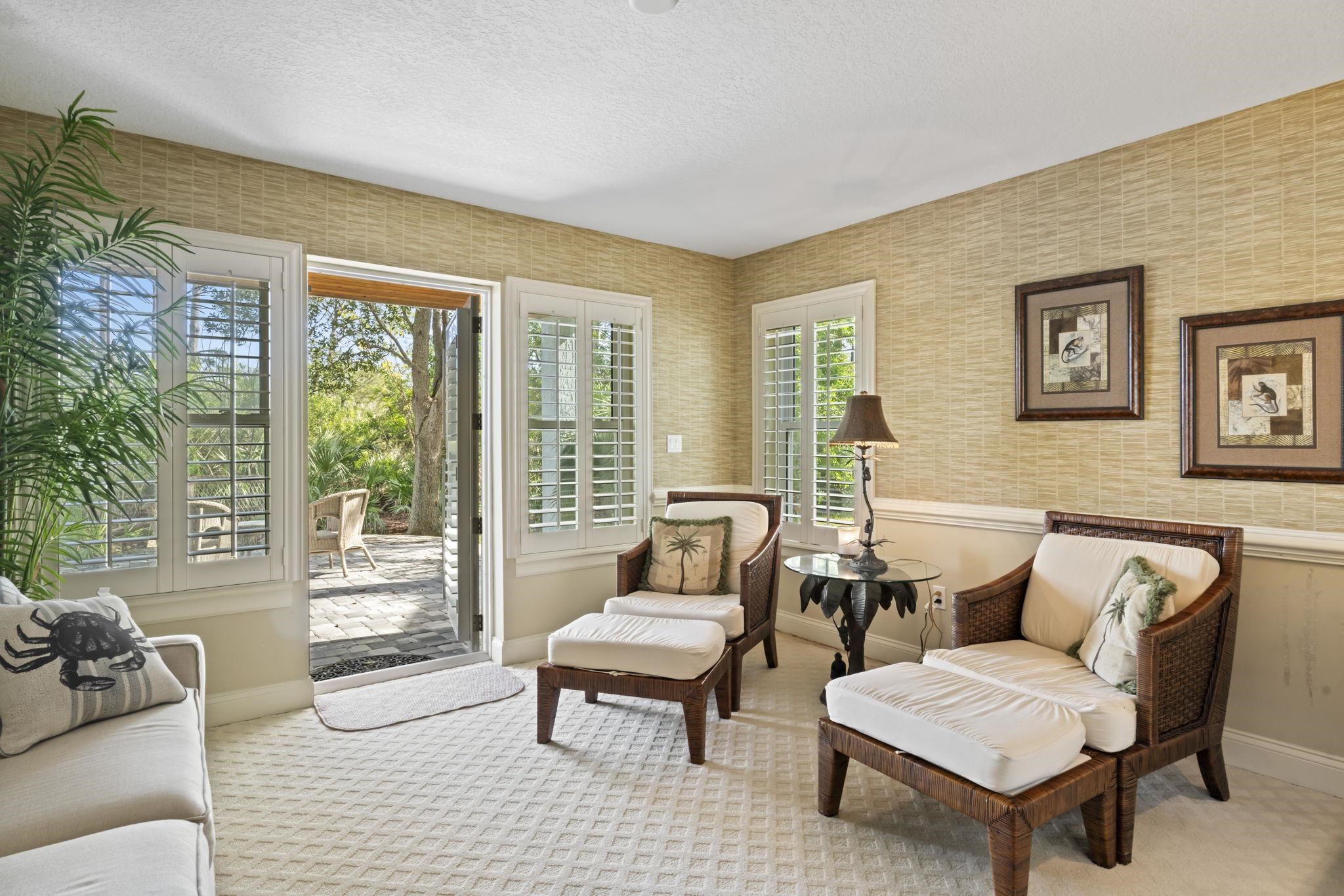 103 Sunset Circle South St. Augustine, FL 32080 - Photo 37 of 55 a living room with furniture and a large window