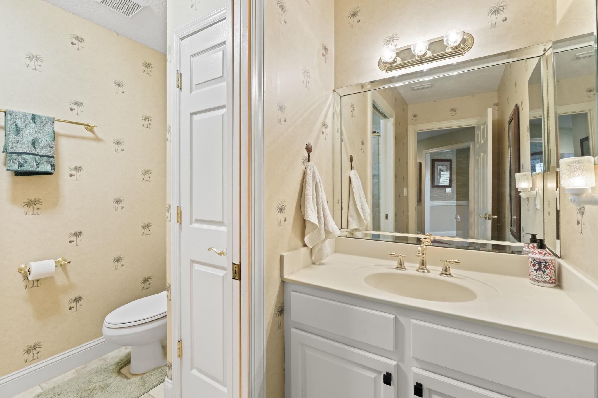 103 Sunset Circle South St. Augustine, FL 32080 - Photo 44 of 55 a bathroom with a sink a toilet and shower