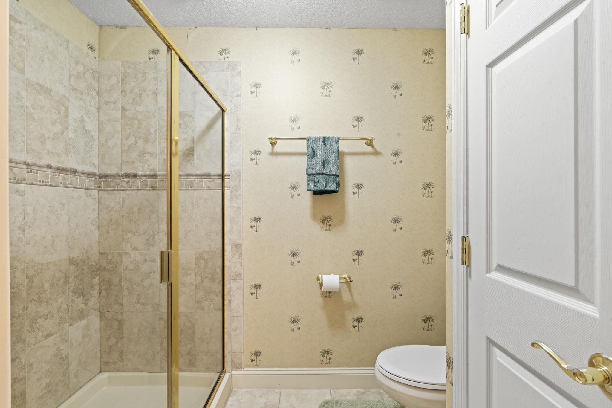 103 Sunset Circle South St. Augustine, FL 32080 - Photo 45 of 55 a bathroom with a shower a toilet and a sink