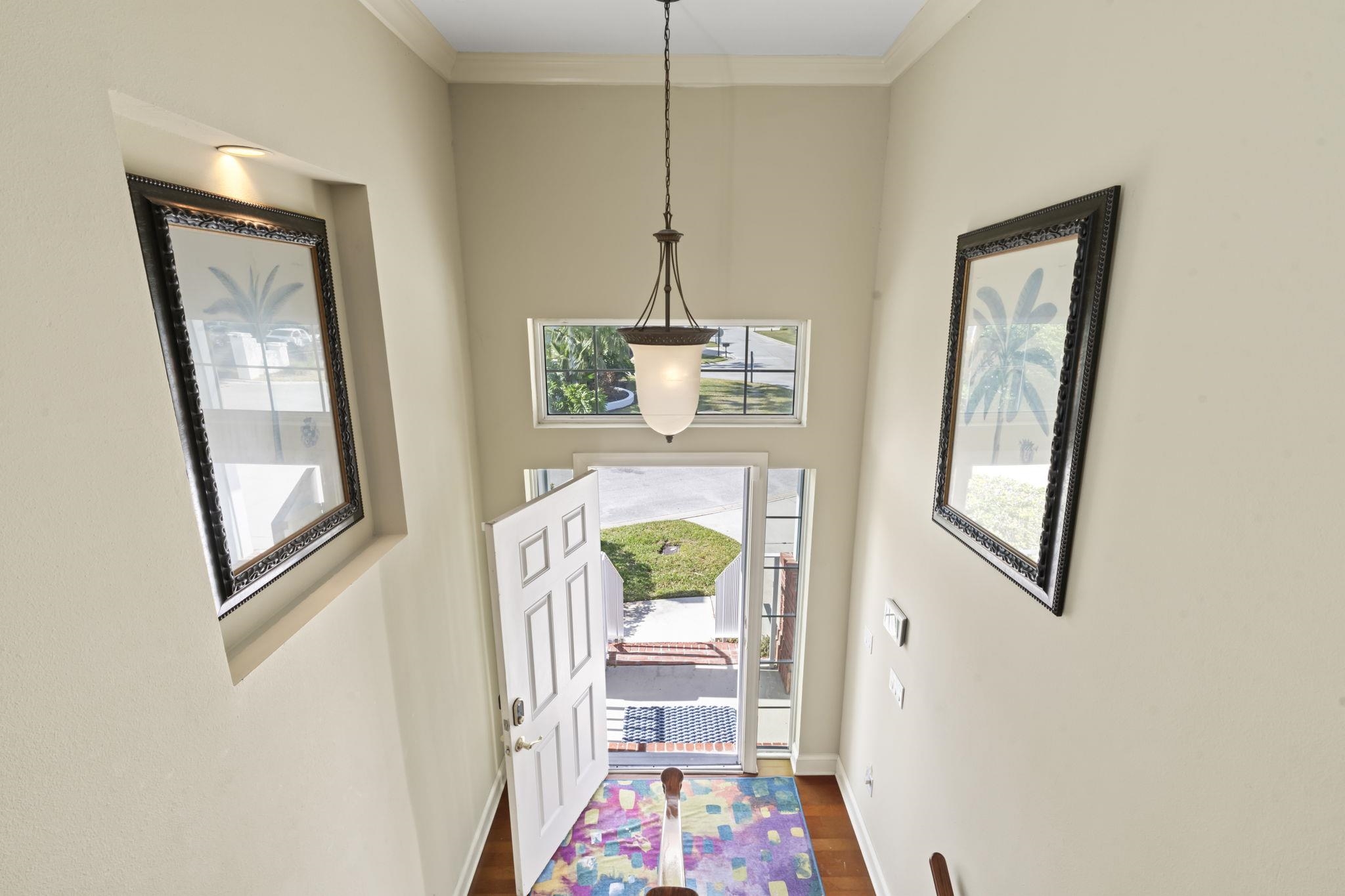 103 Sunset Circle South St. Augustine, FL 32080 - Photo 5 of 55 a front door view of a house and wooden floor
