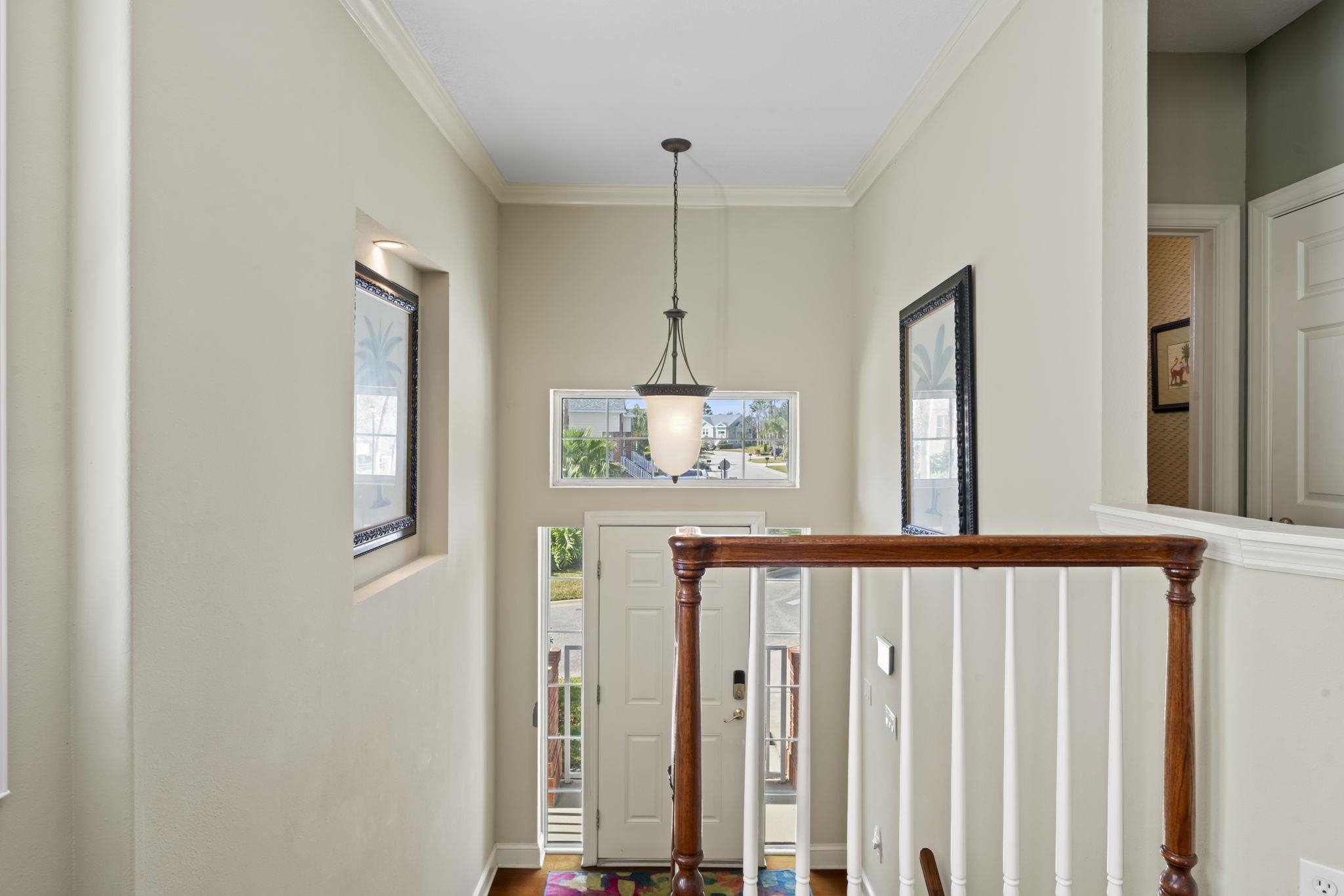 103 Sunset Circle South St. Augustine, FL 32080 - Photo 6 of 55 a view of a hallway with windows