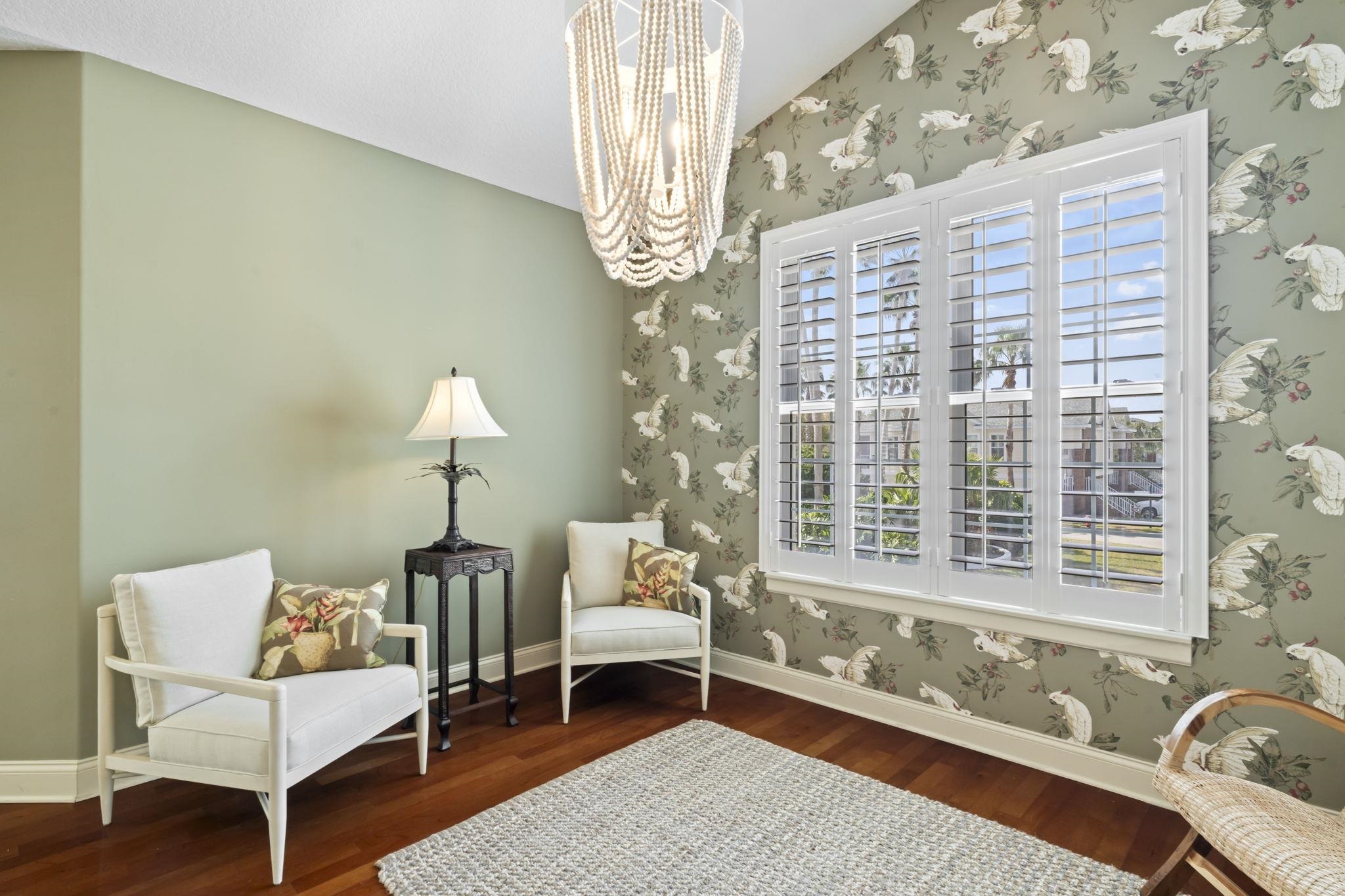 103 Sunset Circle South St. Augustine, FL 32080 - Photo 10 of 55 a living room with furniture and a large window