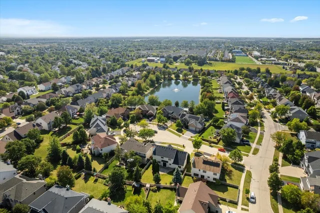 an aerial view of residential building with parking space