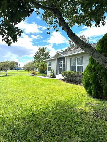 a house view with a garden space