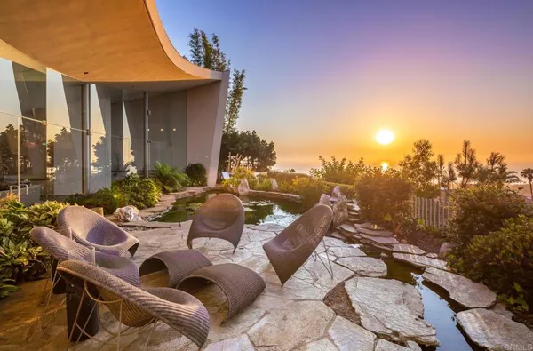 a outdoor space with lots of furniture and garden