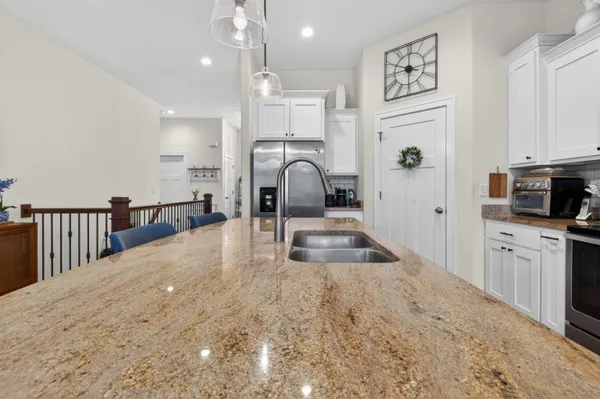 $559,900 | 235 Farmstead Drive East, Slinger, WI 53086