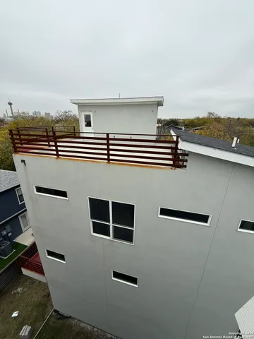 a view of a balcony with an outdoor space