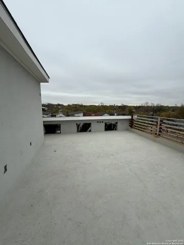 an empty room with furniture