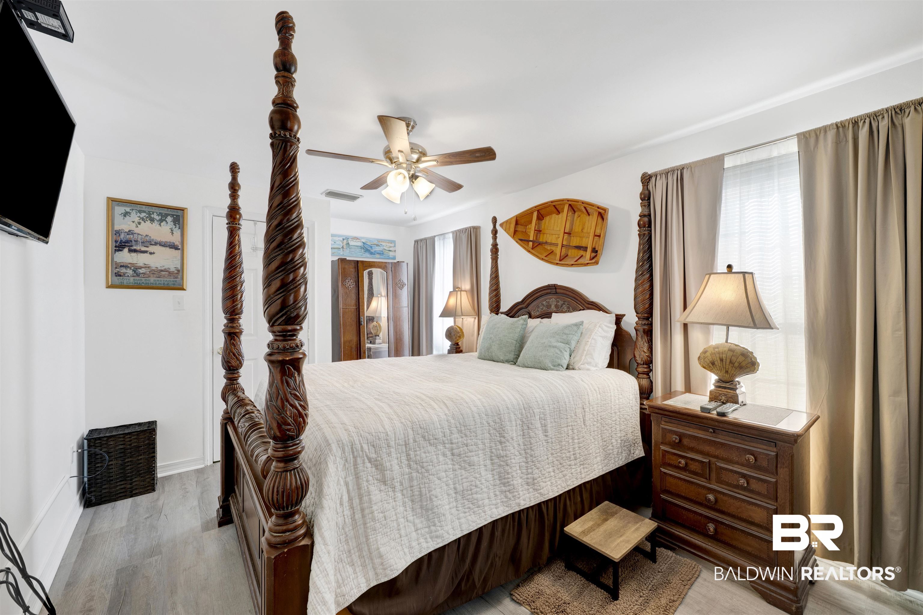 23770 Miflin Road Elberta, AL 36530 - Photo 15 of 38 Bedroom with ceiling fan and light wood-style floors