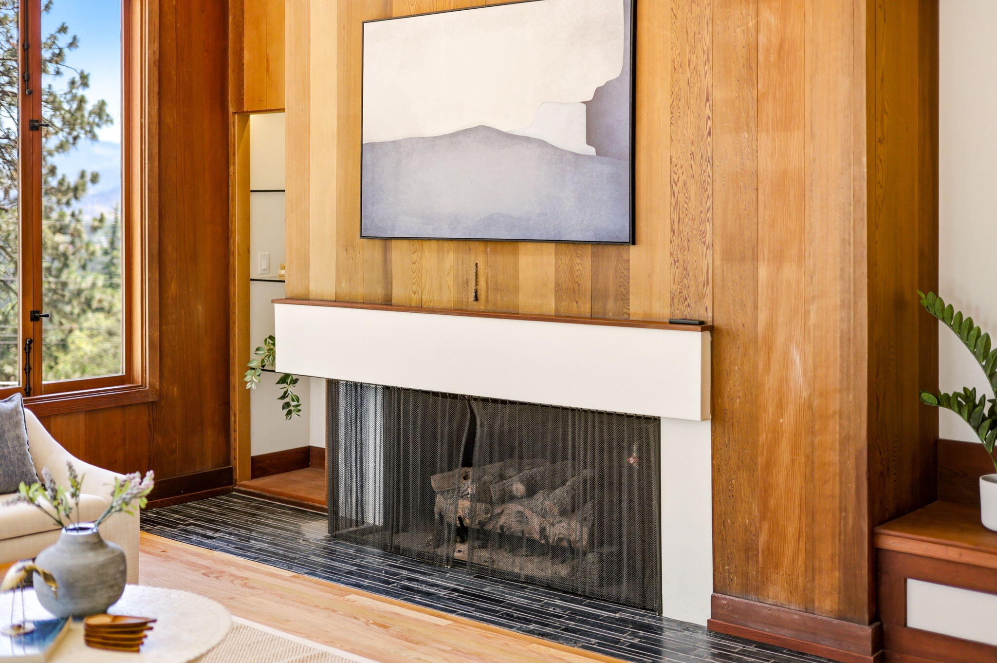 155 Terrace Street Ashland, OR 97520 - Photo 39 of 93 a fireplace with a vase on top of it