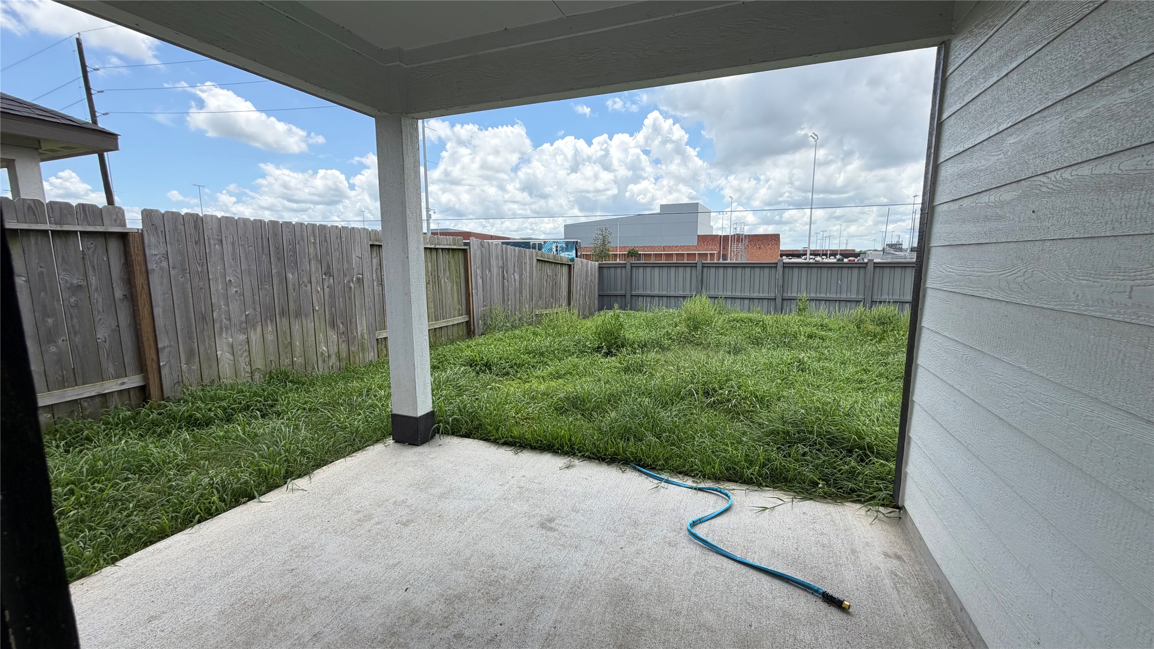 7518 Cynomys Court Rosharon, TX 77583 - Photo 19 of 21 a view of a back yard from a balcony