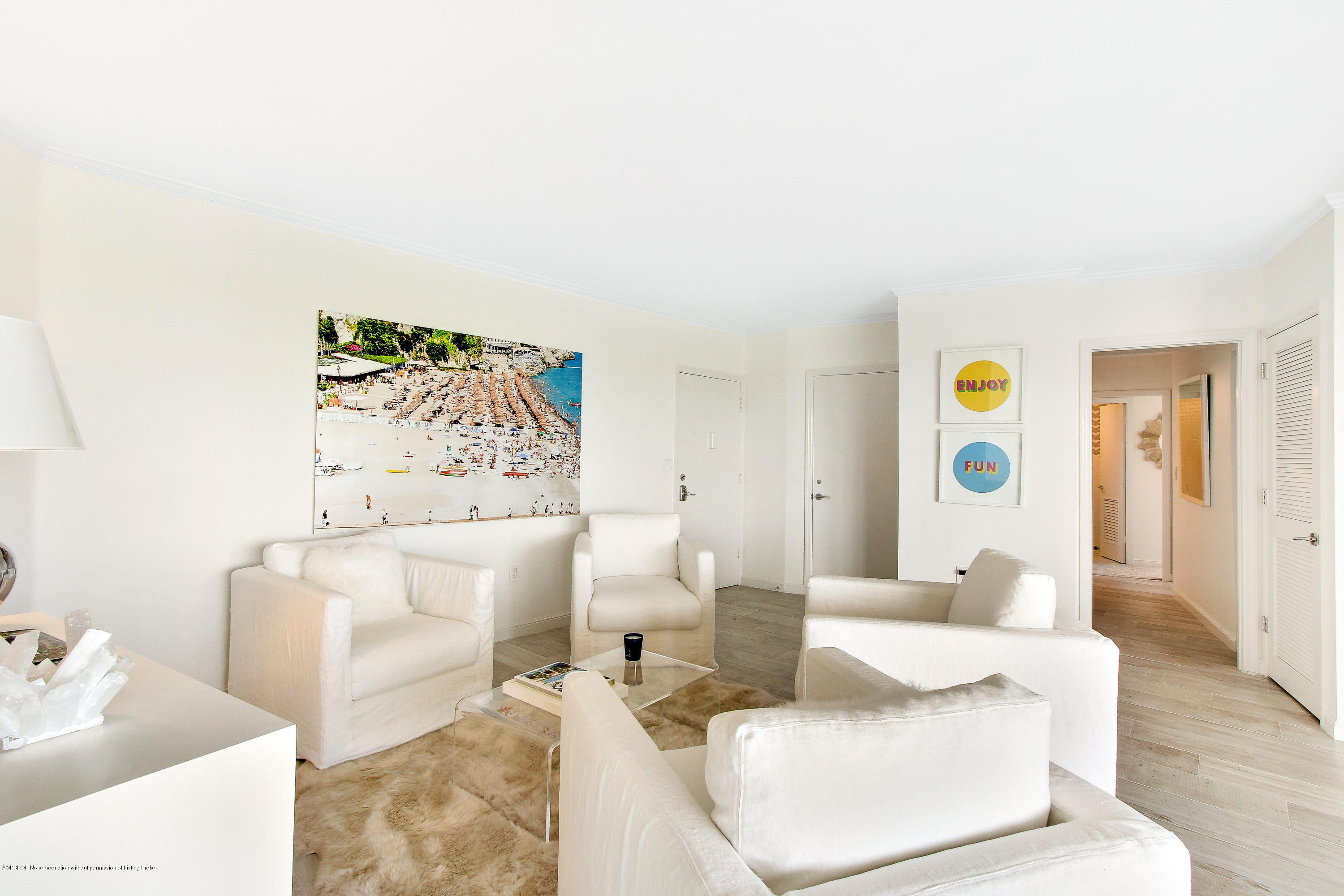 44 Cocoanut Row, Unit 522B Palm Beach, FL 33480 - Photo 2 of 15 a living room with furniture and painting on the wall