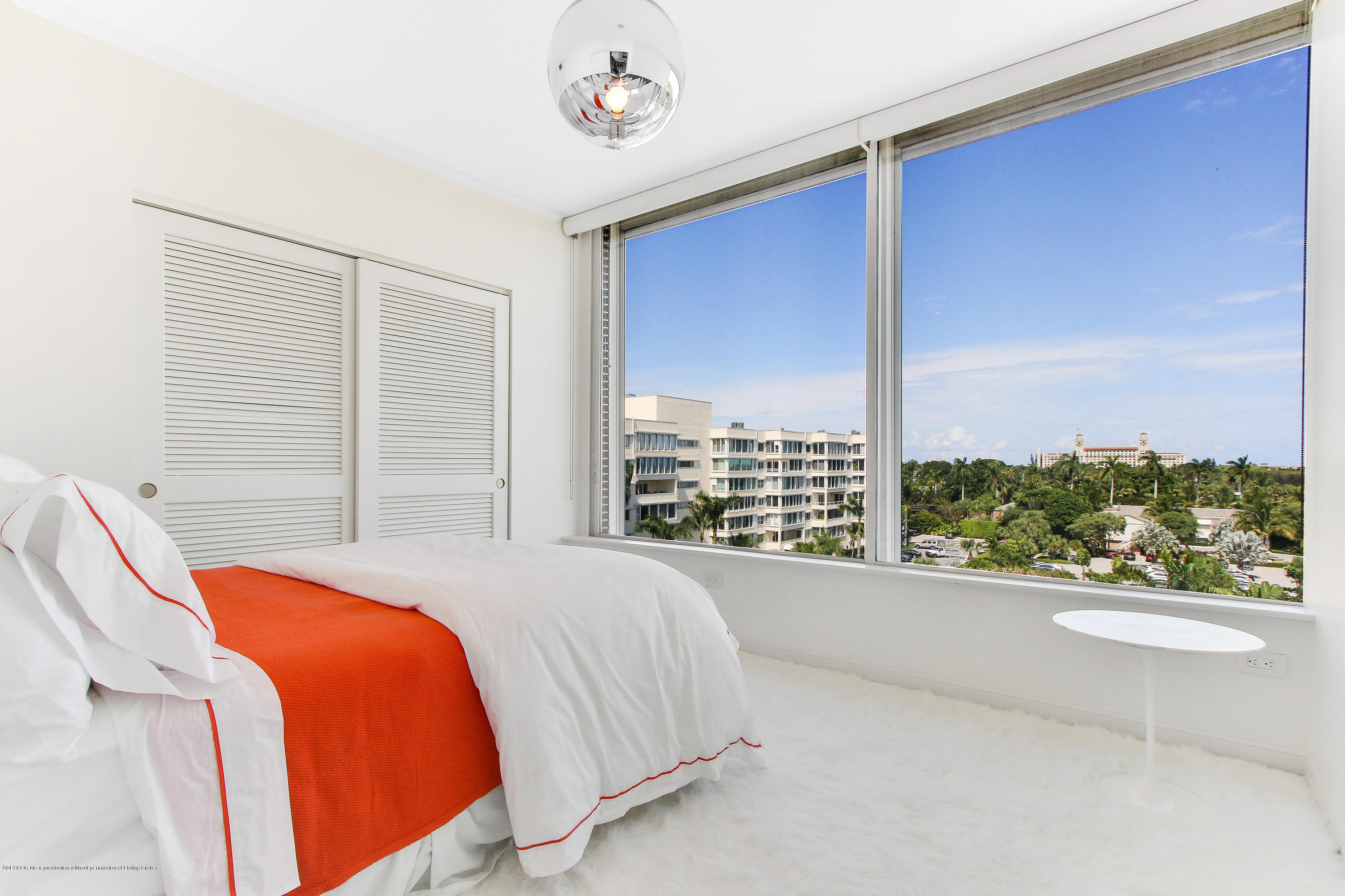 44 Cocoanut Row, Unit 522B Palm Beach, FL 33480 - Photo 12 of 15 a bedroom with a large bed and a window