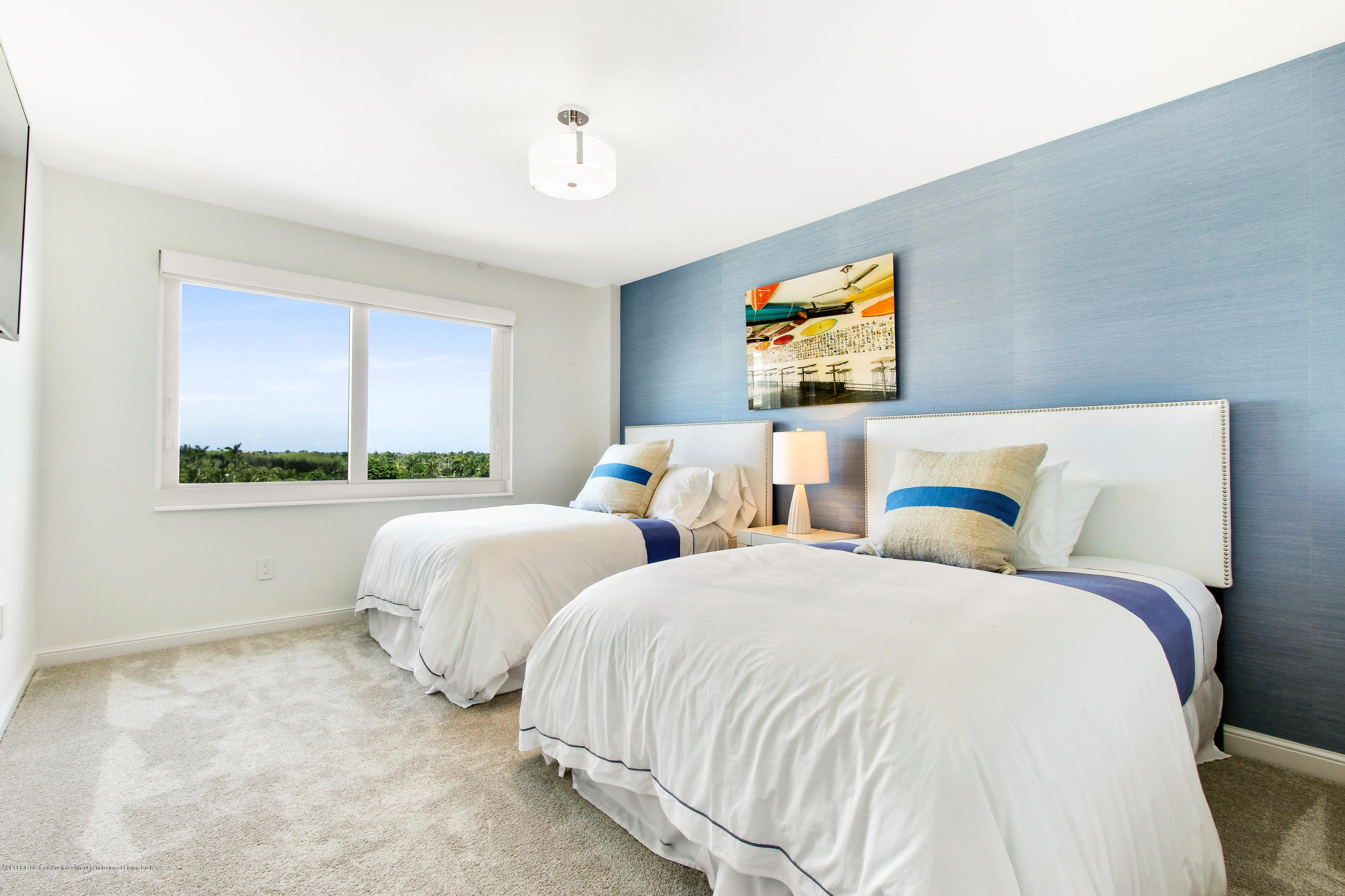 44 Cocoanut Row, Unit 522B Palm Beach, FL 33480 - Photo 14 of 15 a bedroom with two beds and a window