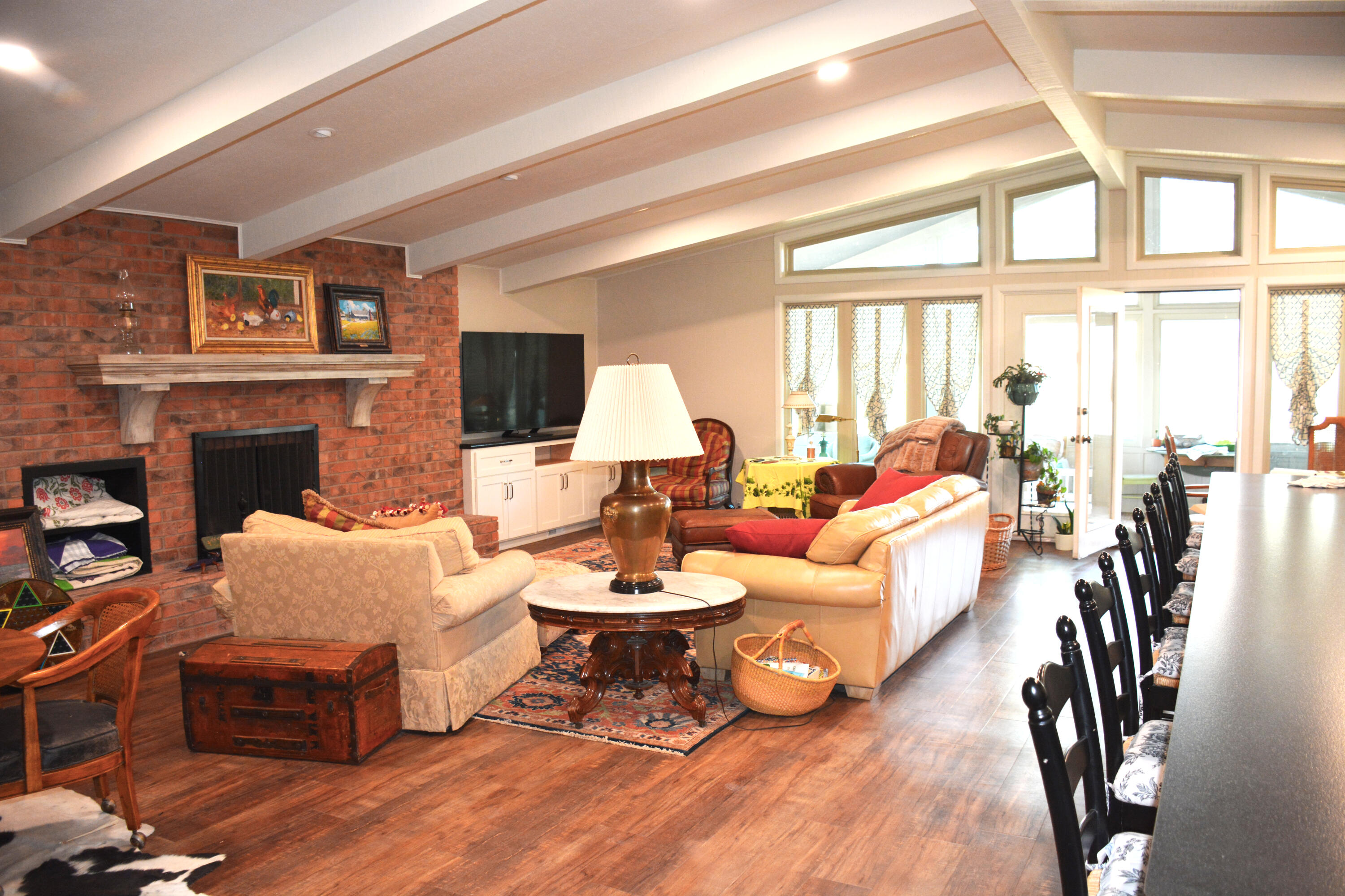 1907 Highway 70 Muleshoe, TX 79347 - Photo 11 of 34 a living room with furniture fireplace and a large window