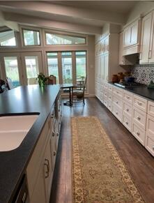 1907 Highway 70 Muleshoe, TX 79347 - Photo 14 of 34 a kitchen with sink and cabinets