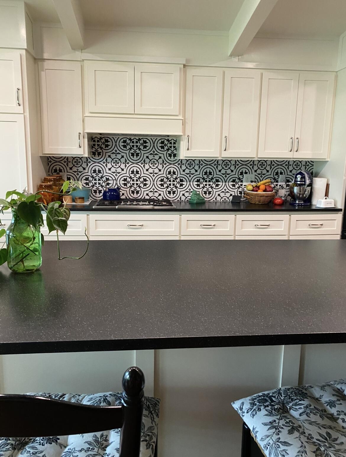 1907 Highway 70 Muleshoe, TX 79347 - Photo 15 of 34 a view of kitchen island with stainless steel appliances granite countertop a sink a stove and white cabinets
