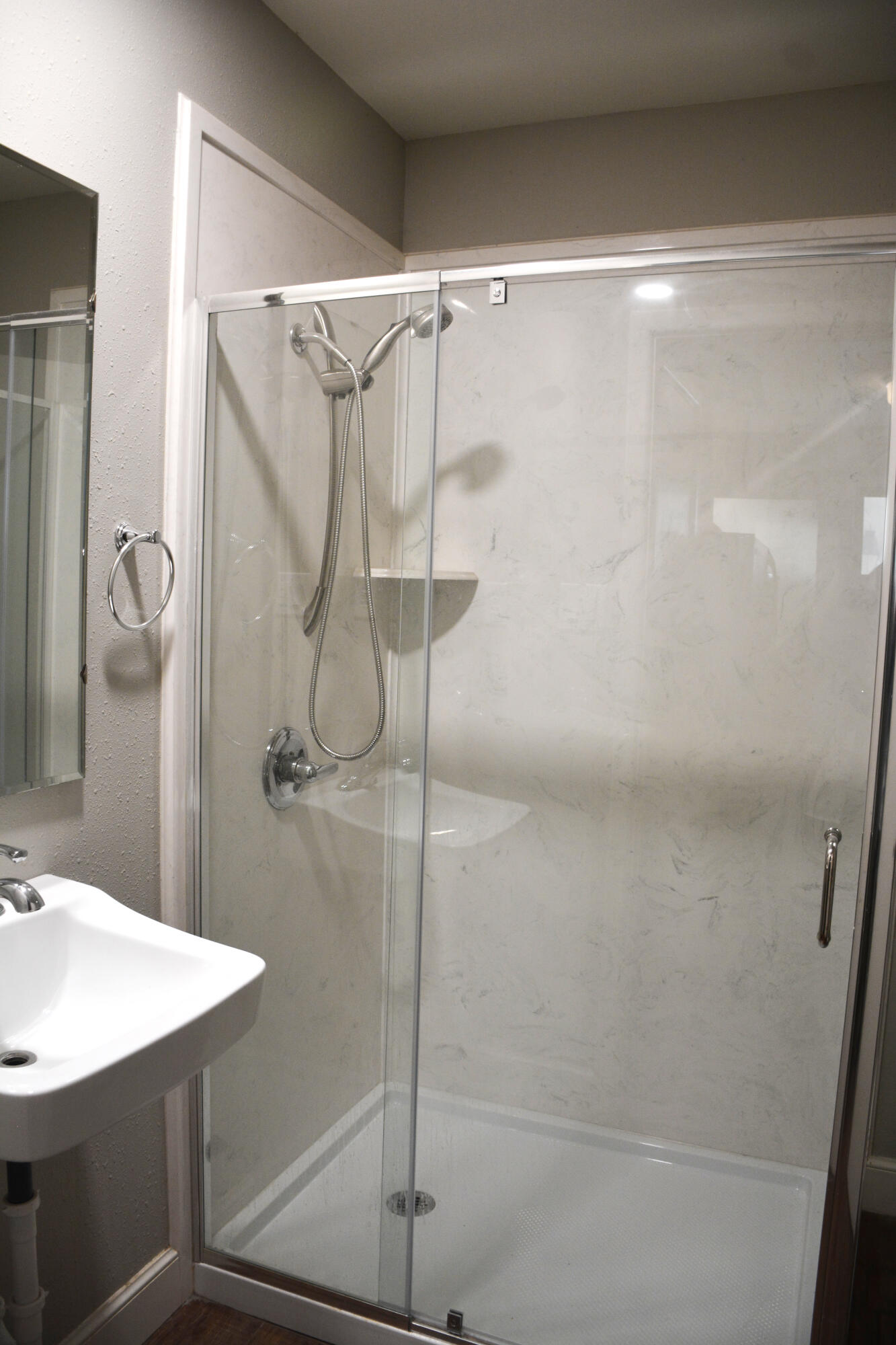 1907 Highway 70 Muleshoe, TX 79347 - Photo 33 of 34 a bathroom with a shower and a sink