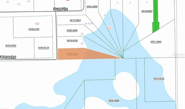 a view of a hallway with two chairs and a potted plant