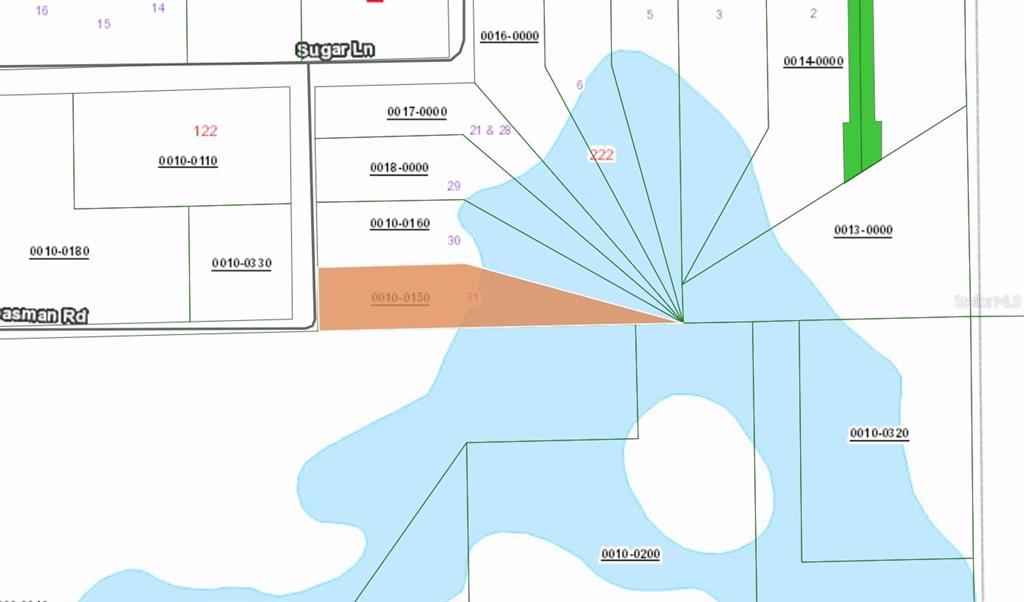 Creasman Road Crescent City, FL 32112 - Photo 4 of 4 a view of a hallway with two chairs and a potted plant