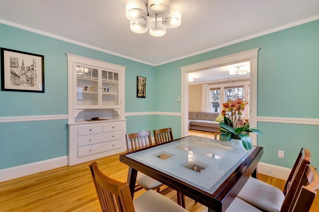 73 Athelstane Road, Unit 73 Newton, MA 02459 - Photo 13 of 20 a view of a dining room with furniture and wooden floor