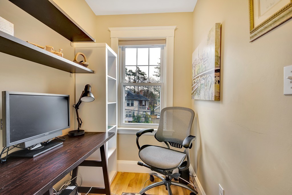 73 Athelstane Road, Unit 73 Newton, MA 02459 - Photo 5 of 20 a view of a workspace with furniture and a window