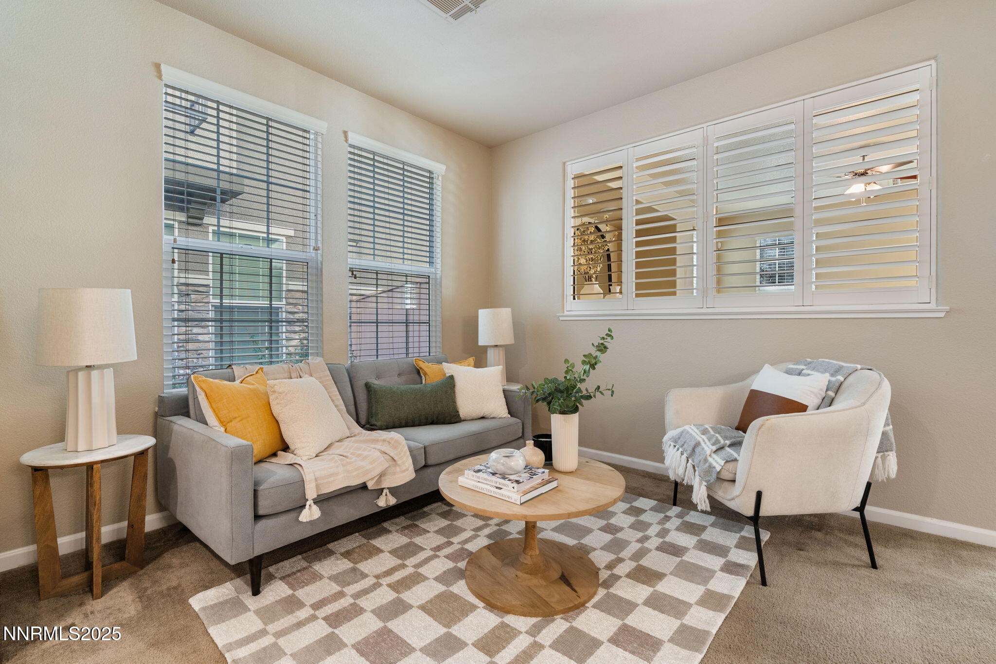 1865 Wind Ranch Road, Unit A Reno, NV 89521 - Photo 2 of 30 a living room with furniture and a large window