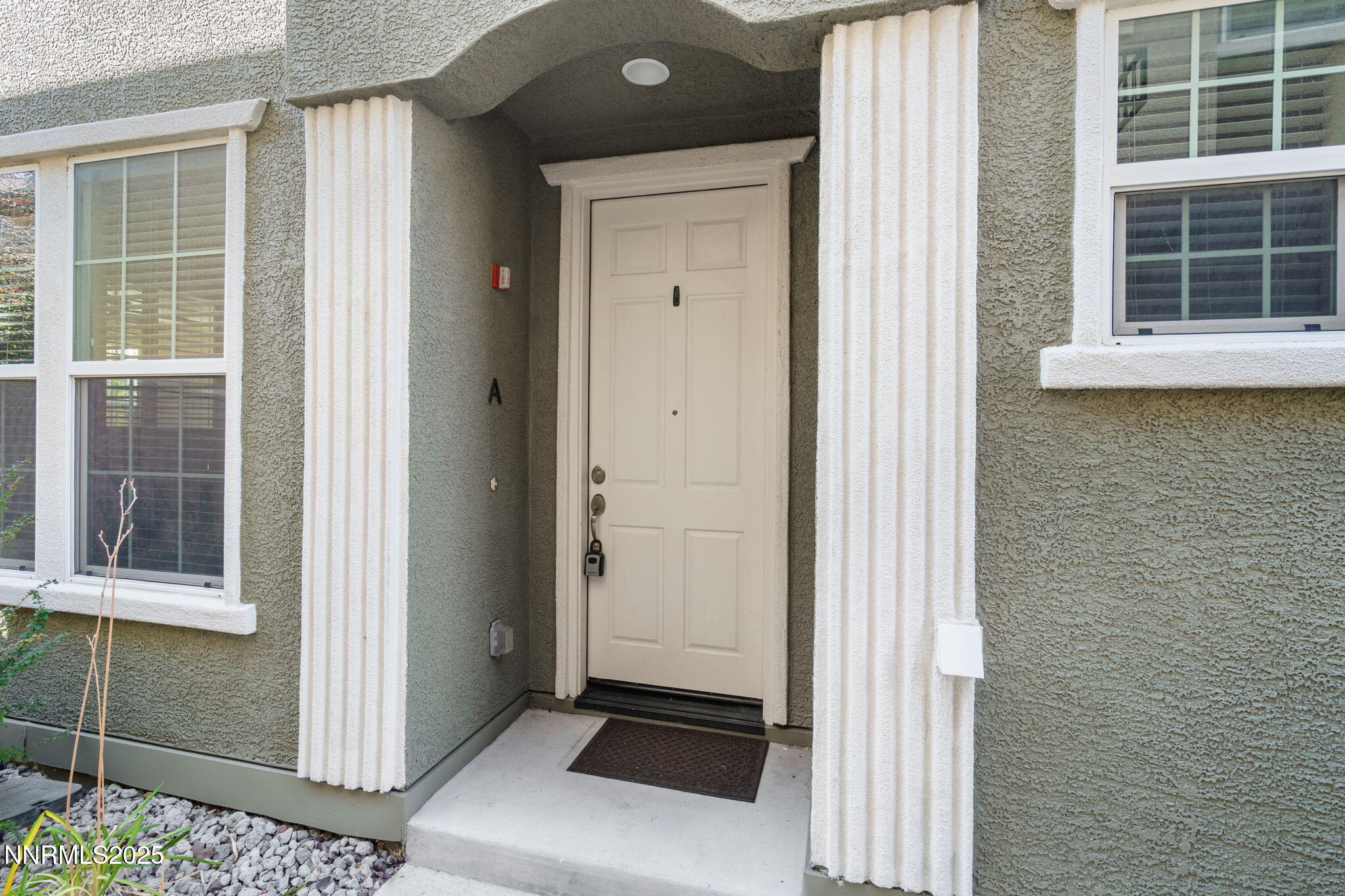 1865 Wind Ranch Road, Unit A Reno, NV 89521 - Photo 29 of 30 a view of front door