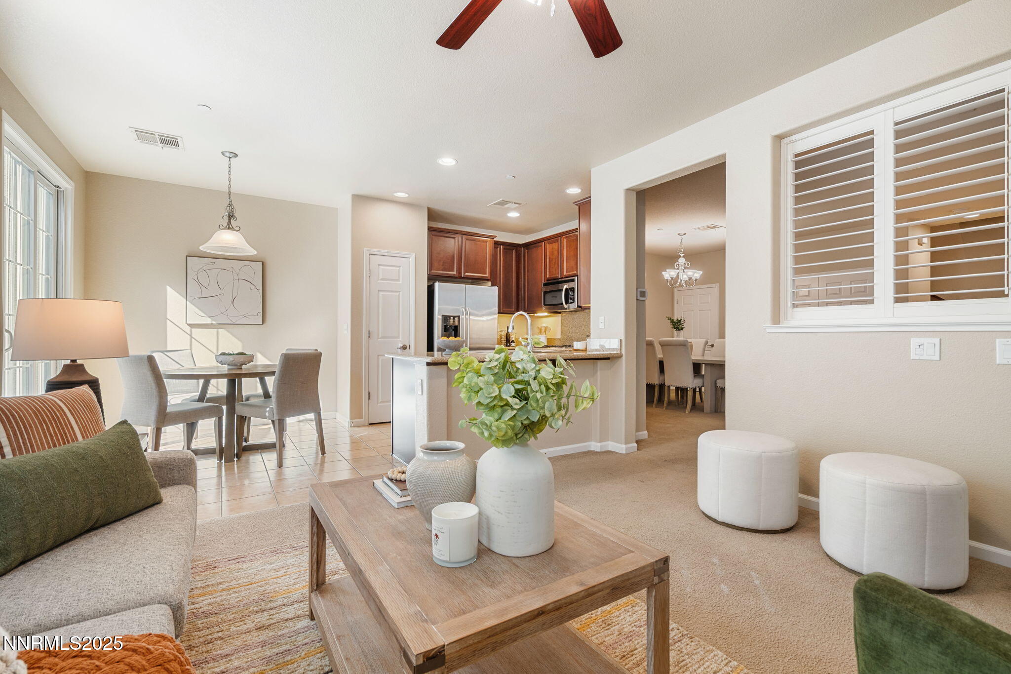 1865 Wind Ranch Road, Unit A Reno, NV 89521 - Photo 6 of 30 a living room with furniture and a potted plant