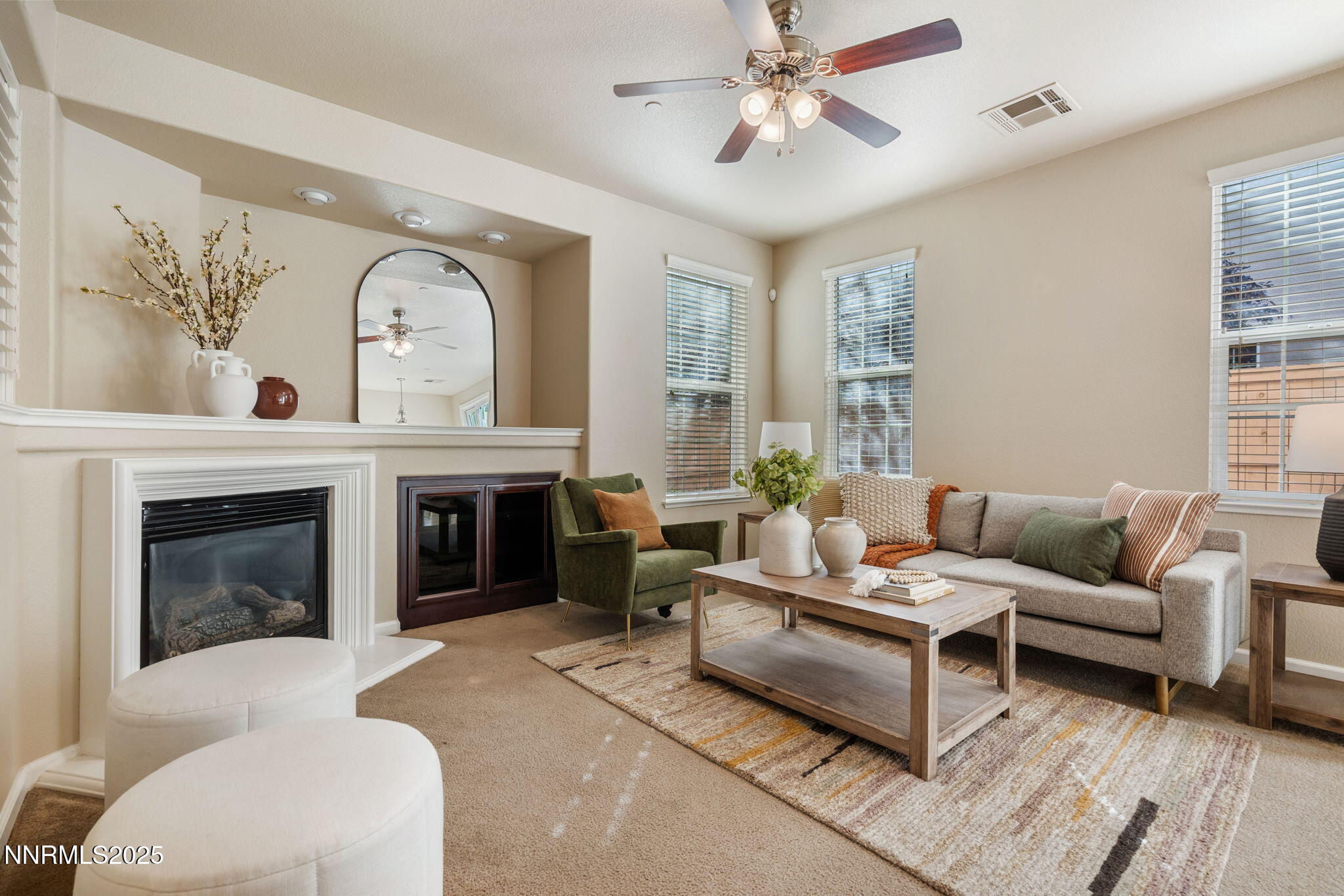 1865 Wind Ranch Road, Unit A Reno, NV 89521 - Photo 8 of 30 a living room with furniture and a fireplace