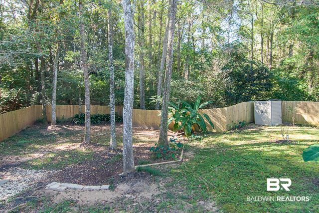 340 Ridgewood Drive Daphne, AL 36526 - Photo 34 of 35 Backyard Storage