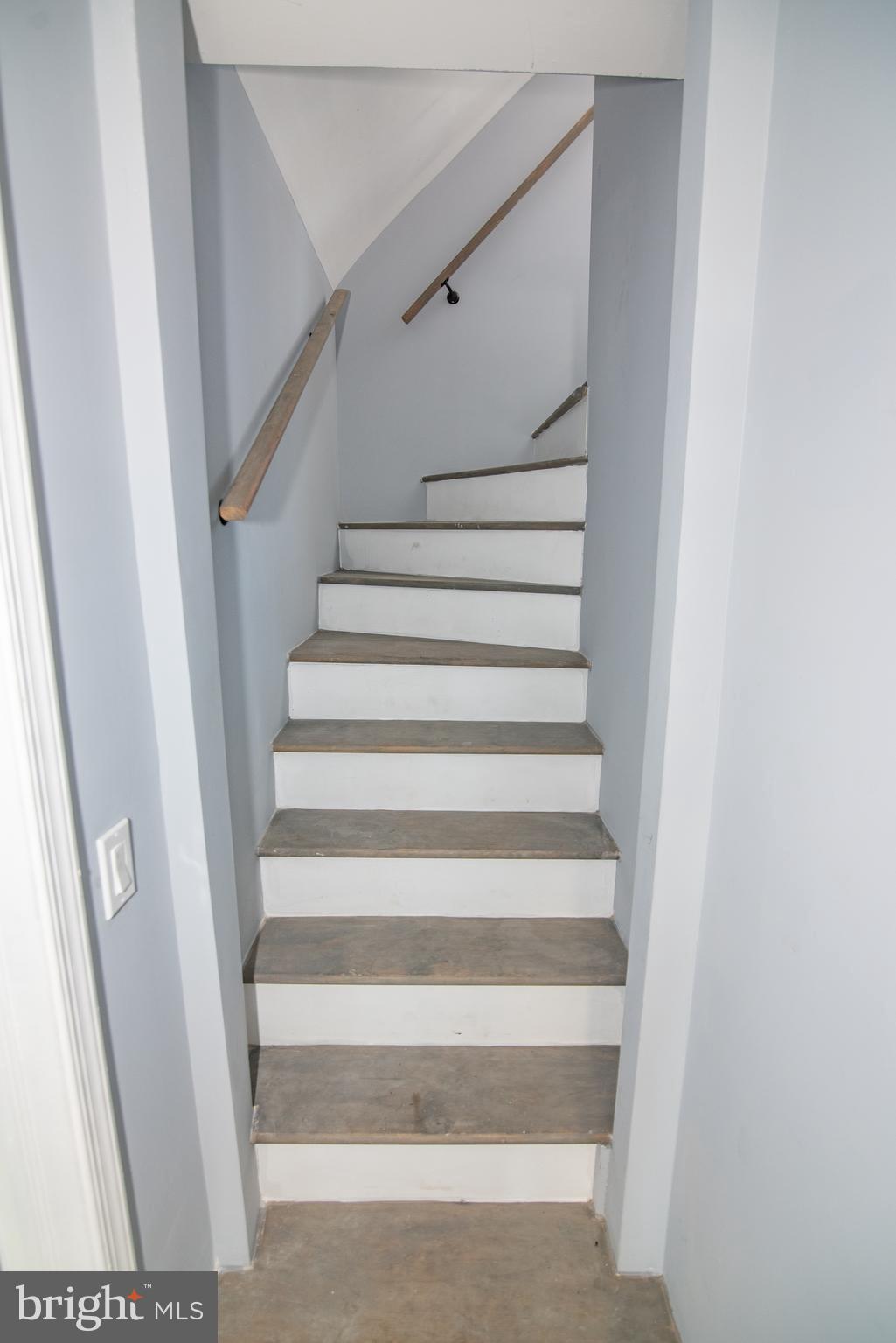 2900 Scherer Avenue Baltimore, MD 21234 - Photo 19 of 37 a view of staircase with white walls and a window