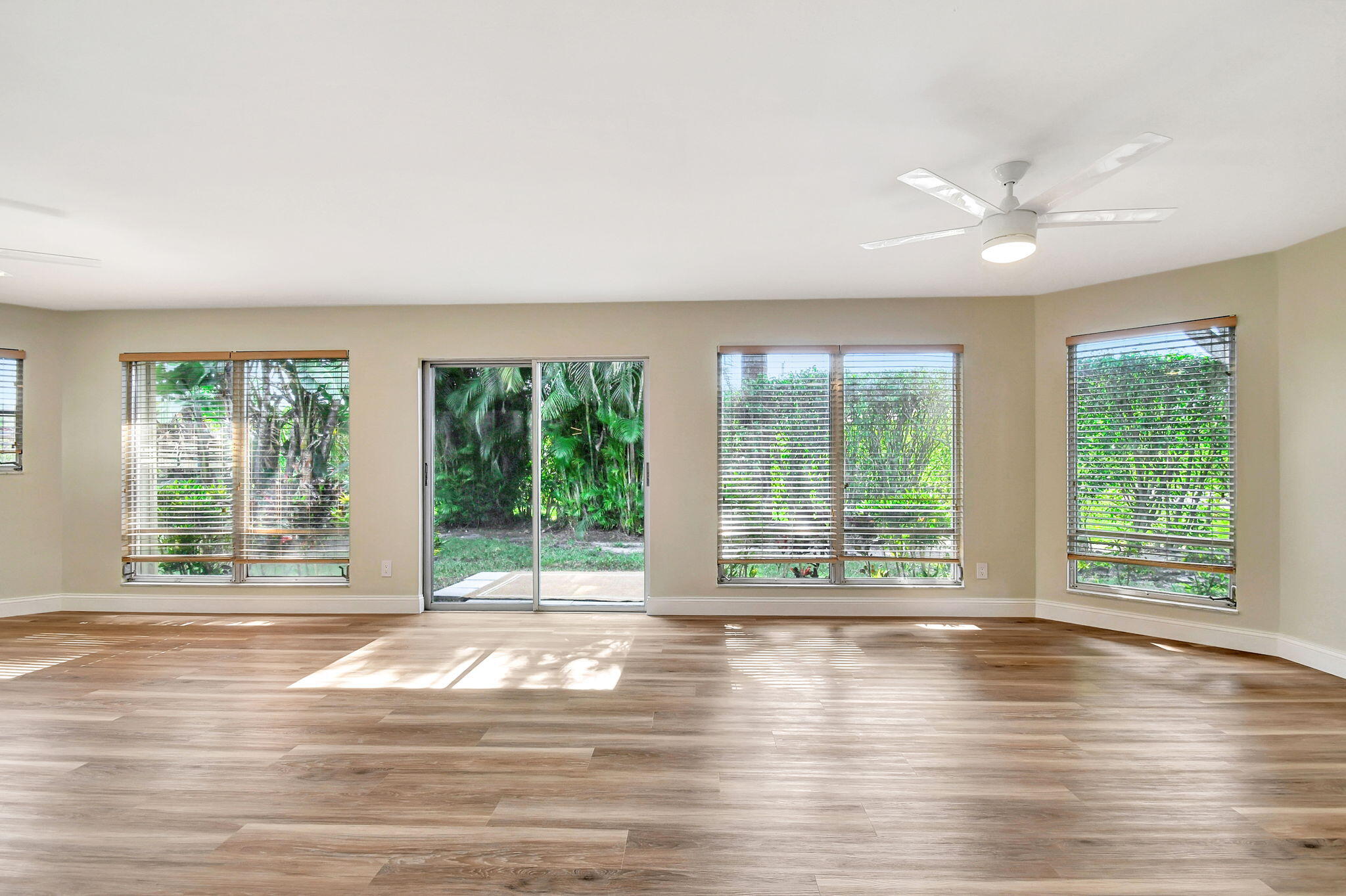 538 Forestview Drive Atlantis, FL 33462 - Photo 20 of 60 Light filled sunroom