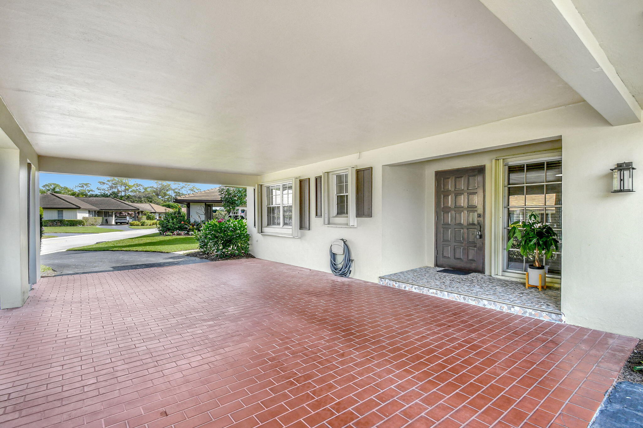 538 Forestview Drive Atlantis, FL 33462 - Photo 4 of 60 Huge Covered Carport