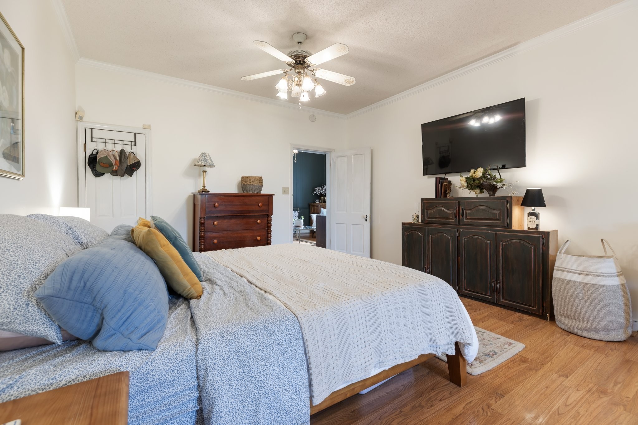 3310 Booker Ridge Road Mount Pleasant, TN 38474 - Photo 14 of 40 a bedroom with a bed and a flat screen tv