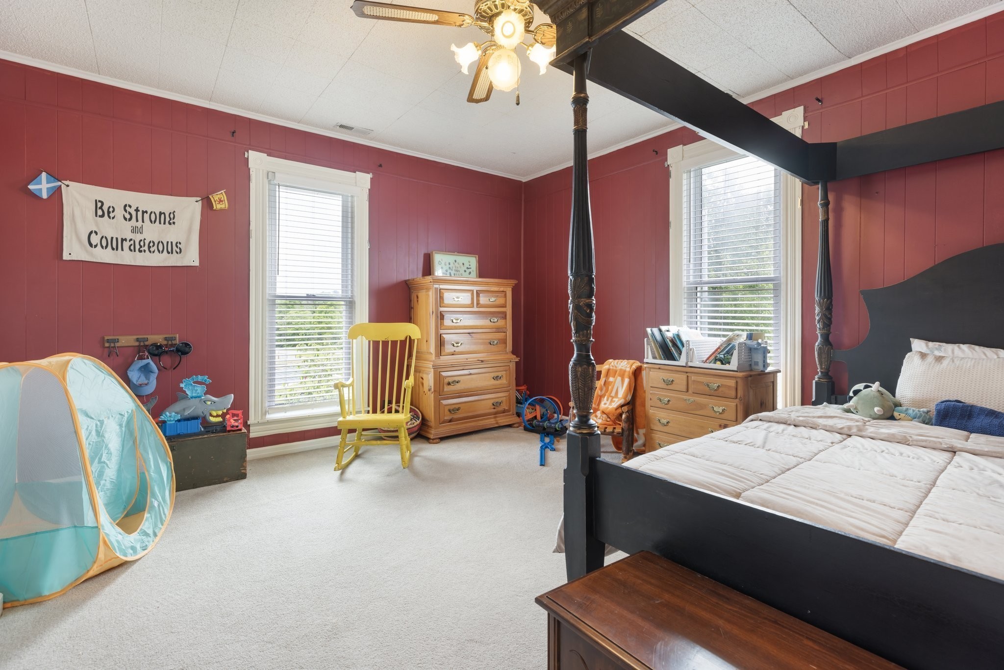 3310 Booker Ridge Road Mount Pleasant, TN 38474 - Photo 26 of 40 a bedroom with furniture and a large window
