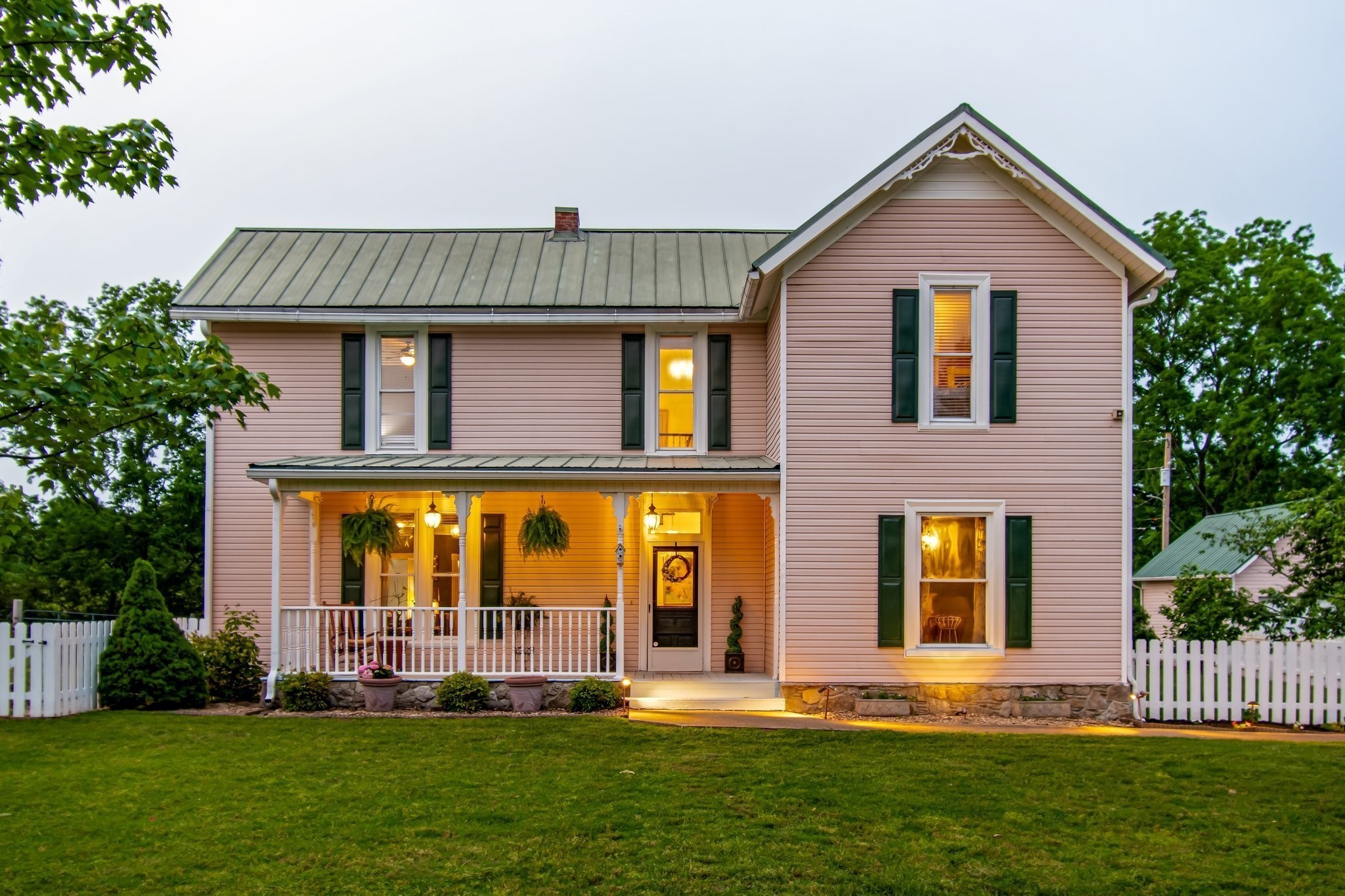 3310 Booker Ridge Road Mount Pleasant, TN 38474 - Photo 32 of 40 a front view of a house with a yard